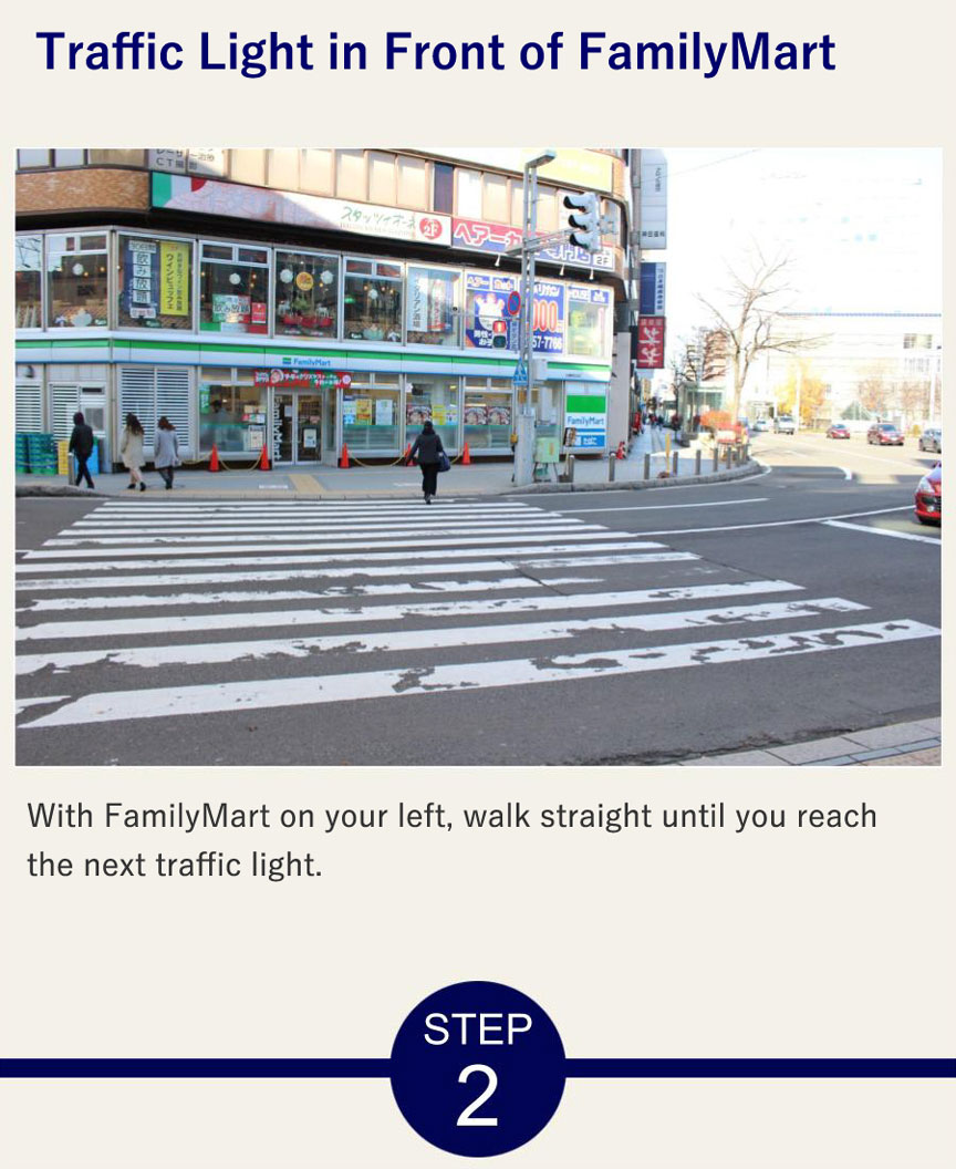 Traffic Light in Front of FamilyMart With FamilyMart on your left, walk straight until you reach the next traffic light.